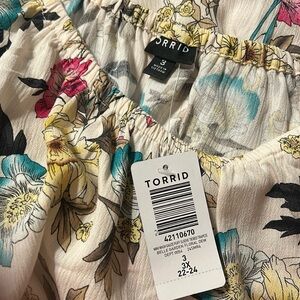Floral dress from Torrid. Still has tags. Never worn.
